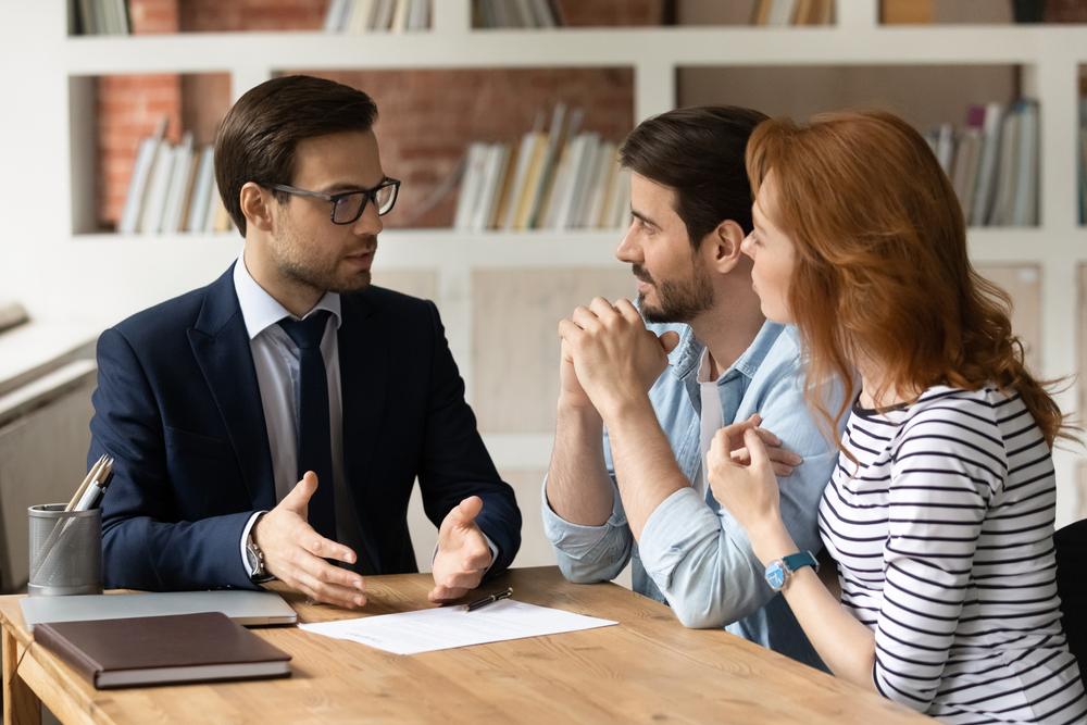 Family members meet with an attorney to discuss when guardianship is necessary for an aging parent in Georgia.